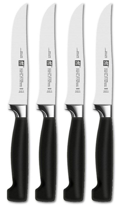 Set of 4 Zwilling Four Star Steak Knives